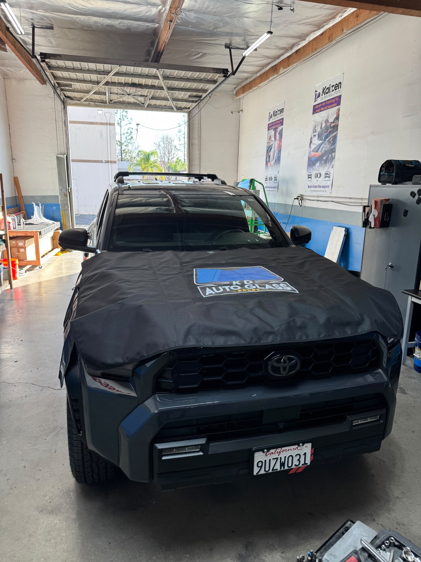 Toyota with its new windshield installed in the shop