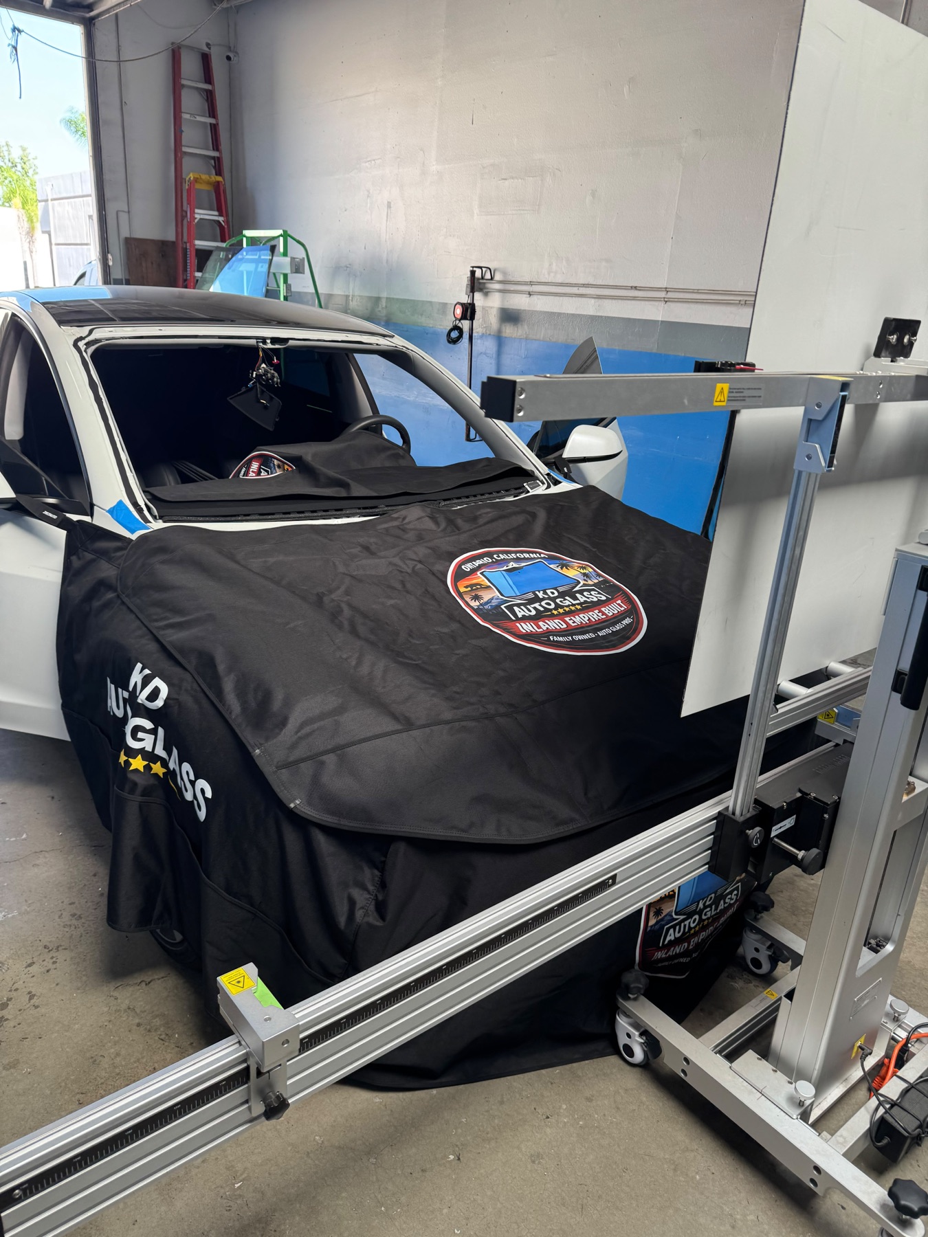 Protected vehicle during the windshield replacement process